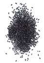 Black cumin seeds isolated on white background. Heap of black nigella seeds. Nigella sativa. Top view. Royalty Free Stock Photo