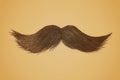 Curly moustache on a retro sepia colored background