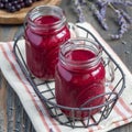 Black currant, greek yogurt, honey and lavender smoothie in glass jar, square format Royalty Free Stock Photo