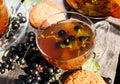 Black currant herbal tea, berries and oatmeal cookies