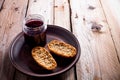 Black currant jam in glass jar and crackers Royalty Free Stock Photo