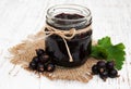 Black currants jam and fresh berries Royalty Free Stock Photo