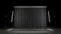 Black curtain backdrop with studio lighting equipment and softbox reflectors Royalty Free Stock Photo