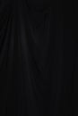 Black Curtain drape wave with studio lighting Royalty Free Stock Photo