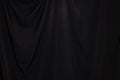 Black Curtain drape wave with studio lighting Royalty Free Stock Photo