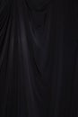 Black Curtain drape wave with studio lighting Royalty Free Stock Photo