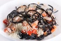 Black cuttlefish spaghetti with tomato sauce Royalty Free Stock Photo