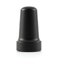 A black, cylindrical rubber cap with a rounded top. The surface appears smooth and Royalty Free Stock Photo