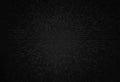 Black dark abstract background with embossed square pattern in center Royalty Free Stock Photo