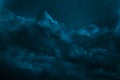 Black dark blue dramatic night sky. Ominous storm rain clouds background. Cloudy hurricane wind lightning. Fantasy mystic creepy Royalty Free Stock Photo