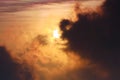 The black and dark red clouds under the sunlight looked scary emotional and strange Royalty Free Stock Photo