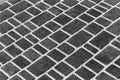 Black dark stone paving slabs floor tile urban texture street road pattern background Royalty Free Stock Photo