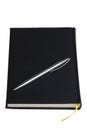 Black daybook and silver pen Royalty Free Stock Photo