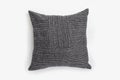 Black decorative pillow isolated on a white background. Royalty Free Stock Photo