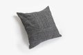 Black decorative pillow isolated on a white background. Royalty Free Stock Photo