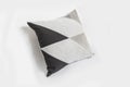Black decorative pillow isolated on a white background. Royalty Free Stock Photo