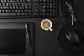 Black desk with coffee