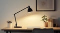 A black desk lamp with an adjustable arm, designed for focused lighting in workspaces Royalty Free Stock Photo