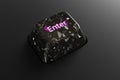 Black diamond keyboard button with neon Enter word on black background Royalty Free Stock Photo