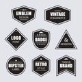 Black different shapes retro and vintage labels and badges icons banners set on gray Royalty Free Stock Photo