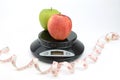 Black digital scale, weight green apple Royalty Free Stock Photo