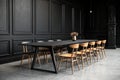 Black dining room table with black and wooden chairs Royalty Free Stock Photo