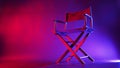 Black Director chair in red and blue light color