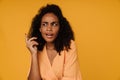 Black displeased woman frowning while looking aside Royalty Free Stock Photo