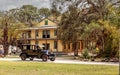 Black 1929 Dodge Brothers Model B drives in front of the 1929 Planetary Court at the 10th Annual Classic Car