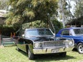 Black Dodge Dart coupe exhibited in Mamacona, Lima