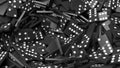 Black domino tiles pile