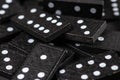 Black Dominoes on dark background, Closeup scattered dominoes on a gray, table. Board game, Game night Dominos table game Royalty Free Stock Photo