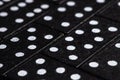 Black Dominoes on dark background, Closeup scattered dominoes on a gray, table. Board game, Game night Dominos table game Royalty Free Stock Photo