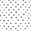 Black doodle paw prints vector seamless background pattern for fabric design Royalty Free Stock Photo