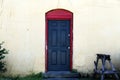 Black door red trim vintage workshop entrance Royalty Free Stock Photo