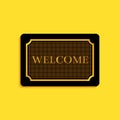 Black Doormat with the text Welcome icon isolated on yellow background. Welcome mat sign. Long shadow style. Vector