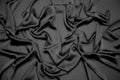 Black draped fabric background Royalty Free Stock Photo