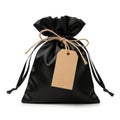 Black drawstring bag with tag isolated on white background Royalty Free Stock Photo