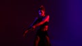 Black dressed and braided hair woman dancehall music style dancing on a blue and red background