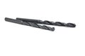 Black drill bit on white background close-up. Tool, drilling, technology, consumables, macro, sharp, black, sharpening