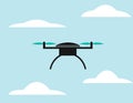 Black drone with blue wings in the sky with clouds