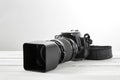 BLACK DSLR Camera with tele lens Royalty Free Stock Photo
