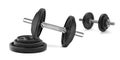 Black dumbbells and dumbbell discs for sports on a white background Royalty Free Stock Photo