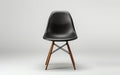 A Black Eames Chair Set on a White Background -Generative Ai Royalty Free Stock Photo