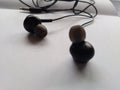 Black earphone for listening music. Download image