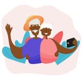 A black elderly couple takes a selfie while traveling. Active grandparents travel together. Royalty Free Stock Photo