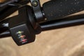 Black electric bike handle close up Royalty Free Stock Photo