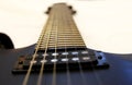 Black electric guitar isolated on the white backgriund Royalty Free Stock Photo