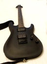 Black electric guitar isolated on the white backgriund Royalty Free Stock Photo
