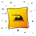 Black Electric iron icon isolated on white background. Steam iron. Yellow square button. Vector Royalty Free Stock Photo